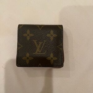 - Louis Vuitton Vintage Change Purse. Good Condition.
